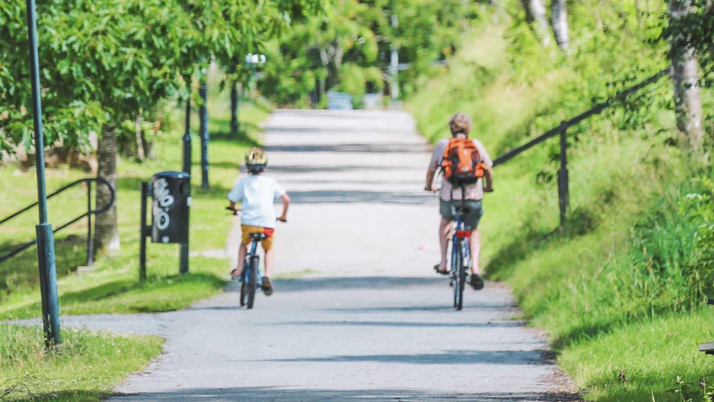 two people riding bikes